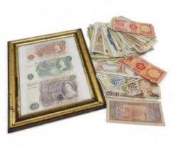 A mixed lot of worldwide banknotes  Condition Report:Available upon request