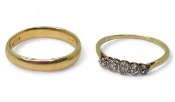 An 18ct gold five stone diamond ring, set with estimated approx 0.50cts of old cut diamonds and