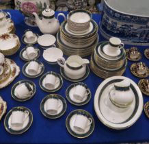 A Royal Doulton Biltmore dinner service comprising soup and dessert bowls, two oval serving