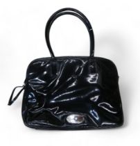 A Mulberry Melanie laptop bag or case in black patent leather,  serial number 746899 Condition