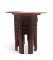 A small lacquered Chinese table with octagonal table Condition Report:Available upon request
