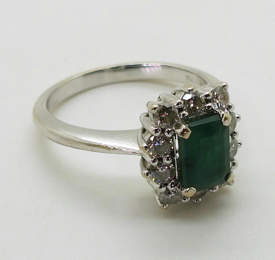 An 18ct white gold diamond and emerald cluster ring, finger size M1/2, weight 5.3gms - Image 2 of 2