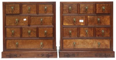 A pair of 20th century Oriental hardwood side chests with burl walnut veneered tops over three short