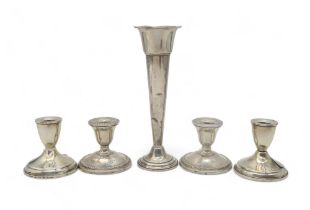 A pair of American Sterling dwarf candlesticks, by Rogers, another pair, (both weighted), a Sterling