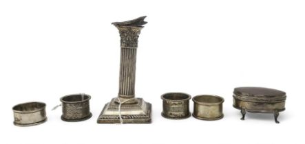 A collection of silver including a silver trinket box, Birmingham 1915, four napk rings, and a