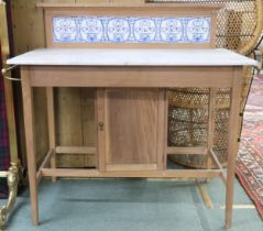 A late Victorian pine wash stand with blue and white tiled backsplash over marble top on pine base