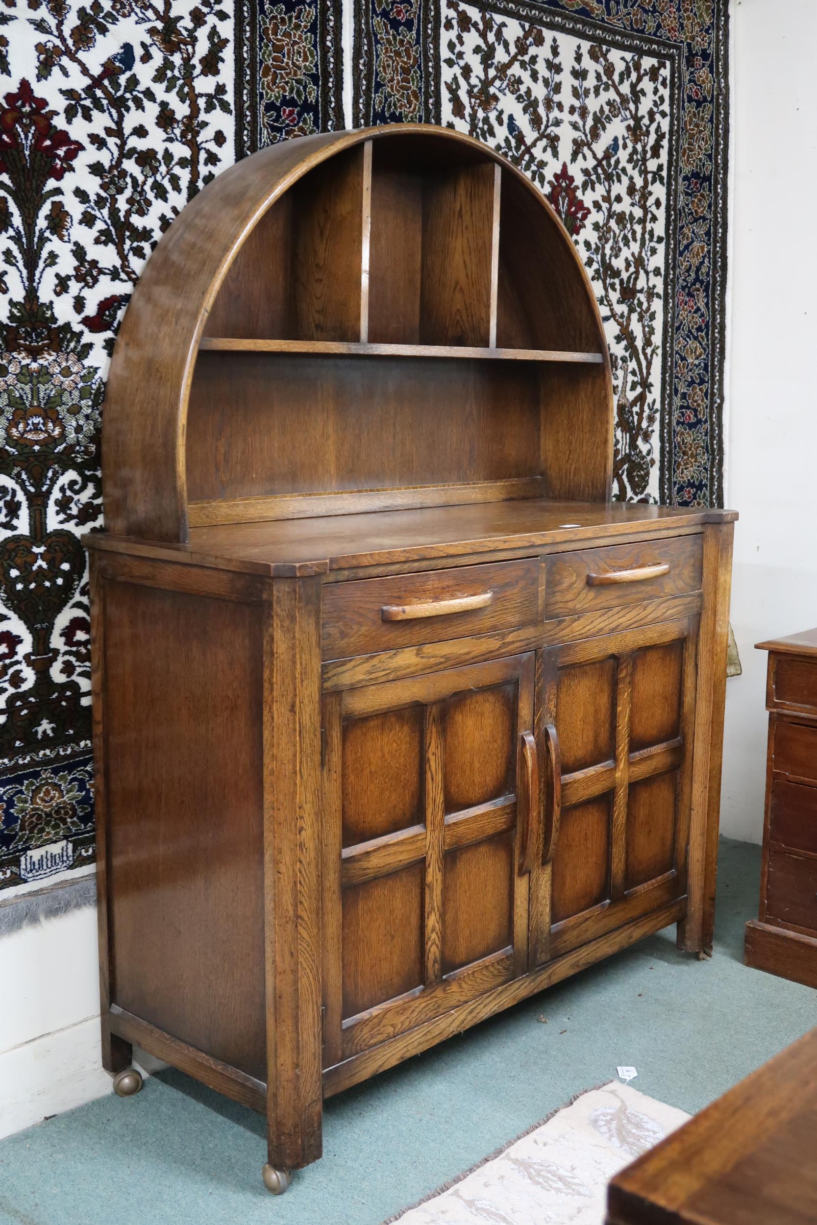 A 20th century oak sideboard with arched shelved back on base with pair of drawers over pair of - Image 2 of 3