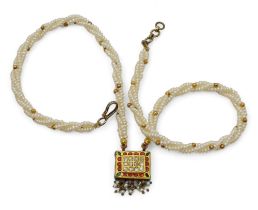 An Indian style, enamelled yellow metal box pendant set with polki diamonds with pearl pendants