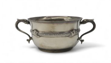 A silver twin-handled sugar bowl, by Adie Brothers, Birmingham 1903, with celtic knotwork banding,