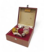 A cased silver travelling communion set, by Albert Edward Jones, Birmingham 1945, engraved 'To the