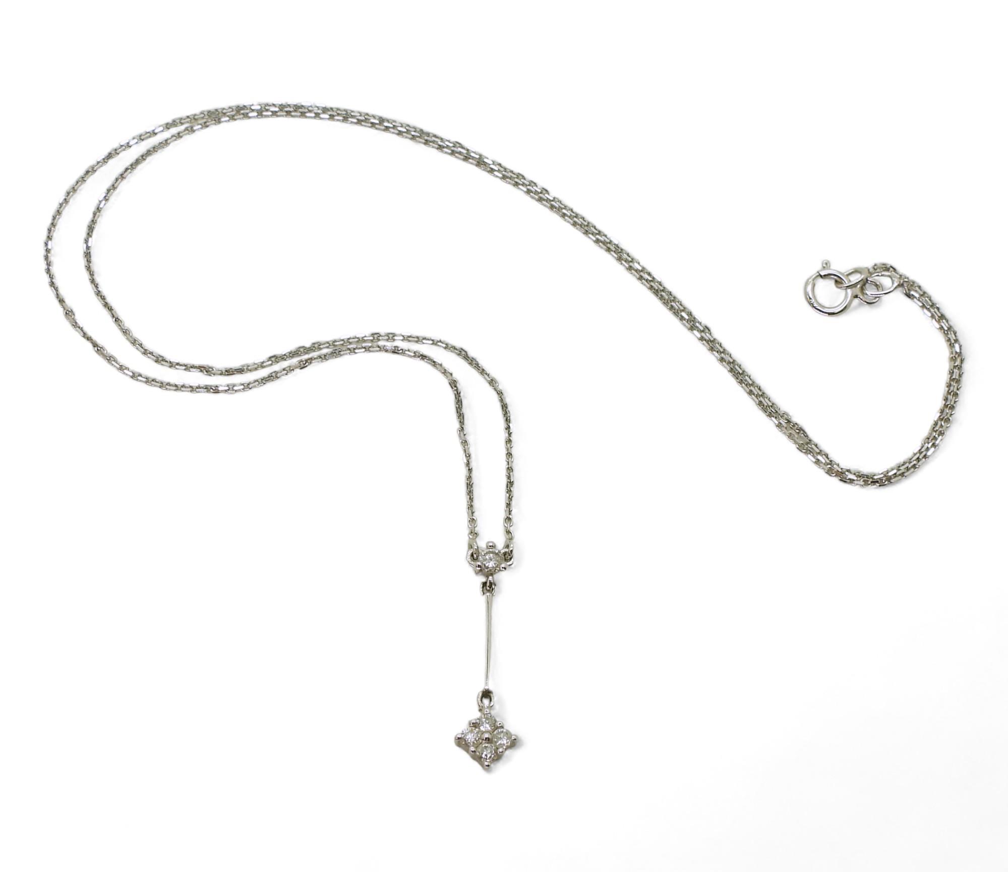 An 18ct white gold diamond pendant necklet, set with estimated approx 0.12cts of brilliant cut