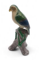 A Chinese glazed pottery parrot figure Condition Report:Available upon request
