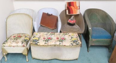A lot comprising five assorted Lloyd Loom and Lloyd Loom style wicker armchairs, wicker hamper,
