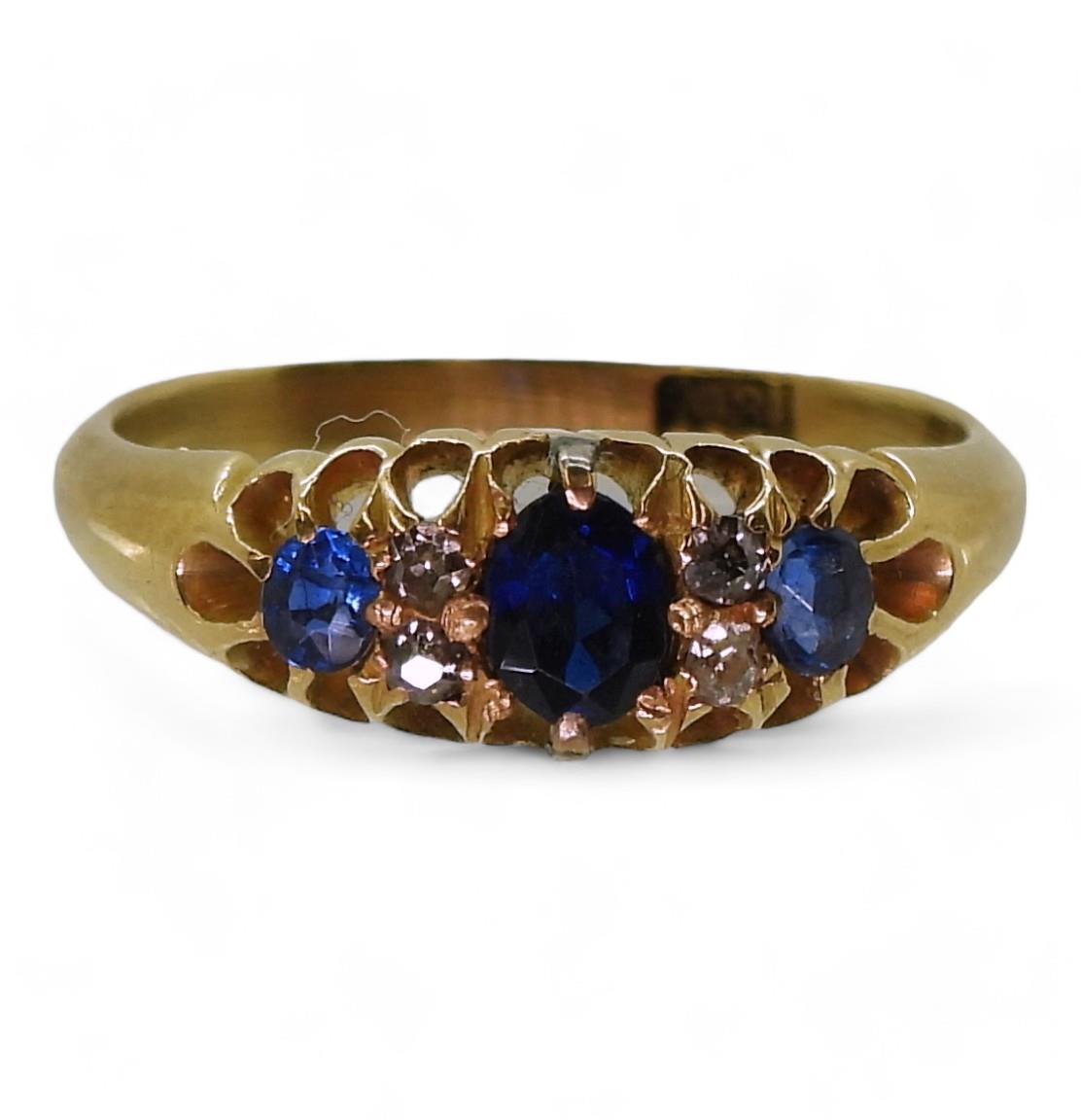 An 18ct gold sapphire and diamond ring, finger size L, weight 3.2gms Condition Report:Available upon