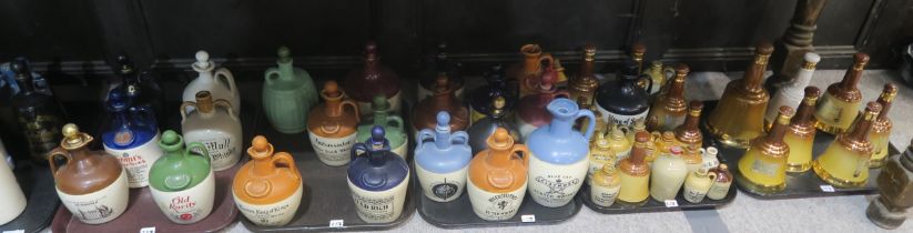 A collection of pottery decanters for various whisky's Condition Report:Available upon request