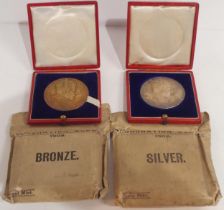 Two cased Edward VII 1902 Coronation Medals, each retaining its original paper packet (2)