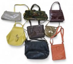 A quantity of ladies handbags, many leather including Prada, Radley, Roger etc Condition Report: