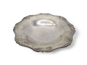 A silver fruit bowl, by Adie Brothers Ltd, Birmingham 1932, with a shaped scrolling shell border,