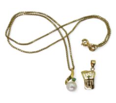 A 14k 38cm, diamond cut box chain, with a 14k pearl and emerald pendant and a yellow metal Chinese