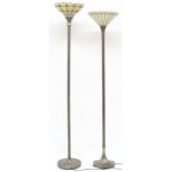 A lot of two assorted metallic based contemporary uplighter standard lamps with tiffany style