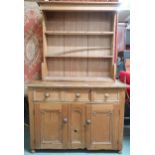 A lot comprising a Victorian pine kitchen cabinet with one long and on short drawers over pair of