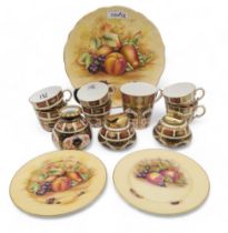 A small group of Royal Crown Derby including six 1128 Imari fluted tea cups, a mug, two table