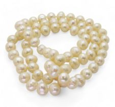 An opera length of baroque pearls each pearl approx 12.3mm x 10mm, overall length 80cm Condition