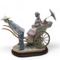 Lladro porcelain group Rickshaw Ride, no. 1383, modelled by Salvador Debon Condition Report:
