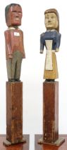 A lot of two carved painted fireside figures modelled as husband and wife, both approximately 90cm