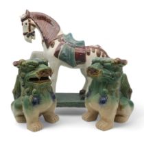 A Chinese style pottery horse, a pair of Fo dos, two ducks and a resin horse Condition Report: