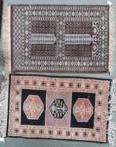 A lot comprising two assorted Persian style rugs 1st, 97cm long x 61cm wide and 2nd, 94cm long x