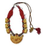 An antique Indian bridal necklace, in bright yellow metal the front half moon shaped pendant is