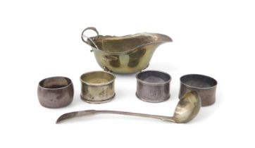 A collection of silver including a silver sauce boat, by Samuel M Levi, Birmingham 1928, four silver