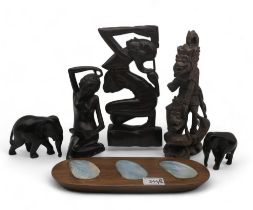 Two carved ebony Balinese female figures, another of a deity, shell inlaid dish, and elephants