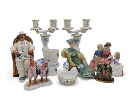 A pair of Herend porcelain candlesticks, a cockerel and hen group, a eggcup and pierced heart shaped