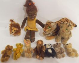A small Steiff tiger, with button to ear, together with a small collection of further creatures, all