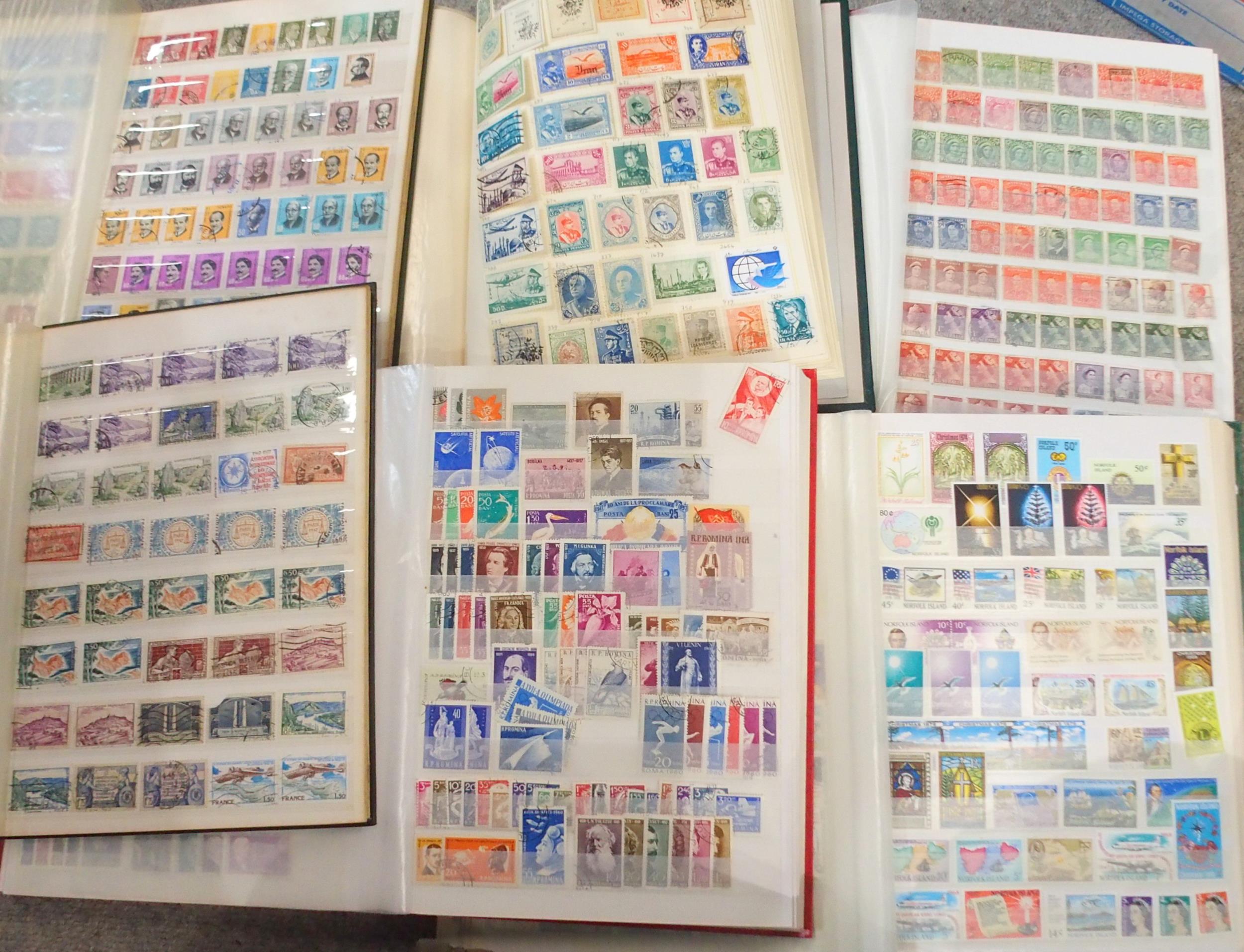 A large worldwide stamp collection in folders and stock books with extensive United States,