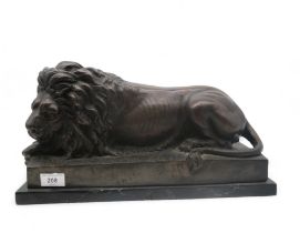 After Isadore Bonheur, a bronze figure of a recumbent lion,  on marble base Condition Report: