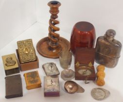 An olivewood candlestick with spiral twist stem, pocket compass, Mauchline ware vesta case showing