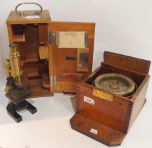 An oak-cased binnacle compass by Mercantile Stores Ltd. of Middlesbrough, together with a cased