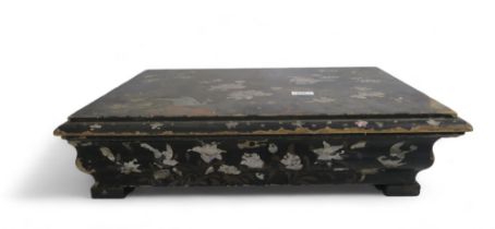 A large oriental lacquered wood box with inlaid decoration of peacocks and tree peonies Condition