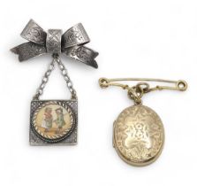 A 10k gold fob brooch, with a back & front yellow metal Victorian locket enclosing hair art,