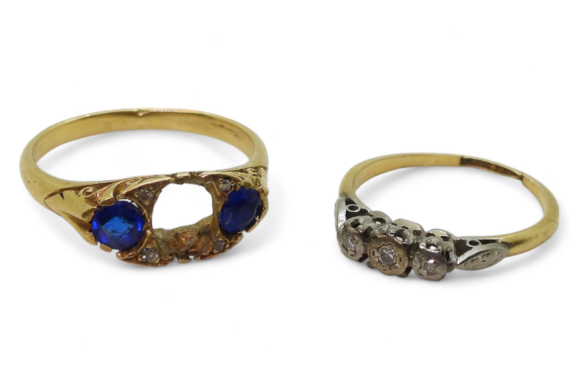 An 18ct classic scroll ring set with blue gems and diamond accents size R and an illusion set