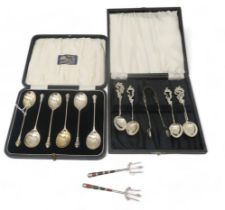 A cased set of silver acorn finial spoons, by Docker & Burn, Birmingham 1925, another set with