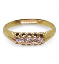 An 18ct gold five stone diamond ring, set with estimated approx 0.10cts, size M, weight 2.5gms