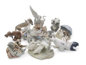 A collection of Lladro and other porcelain animal and bird groups Condition Report:Heron group has