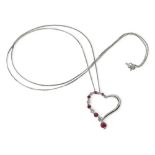 A 9ct white gold ruby and diamond heart pendant, set with estimated approx 0.15cts of brilliant