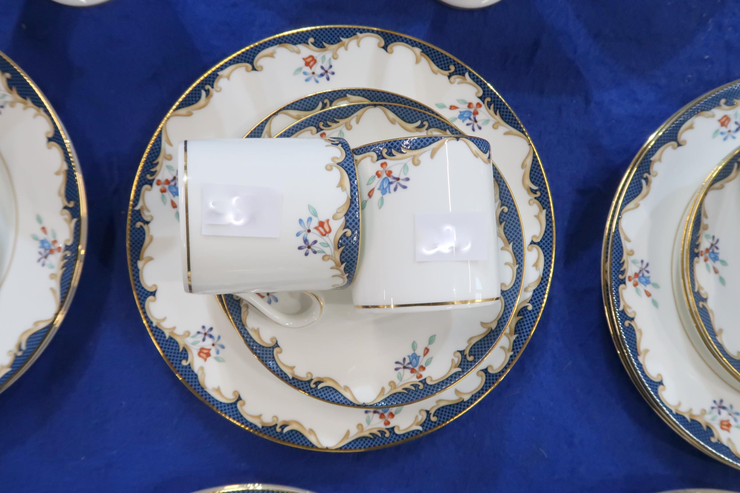 A Wedgwood Chartley pattern dinner service for twelve comprising plates, bowls, coffee cups and - Image 2 of 2