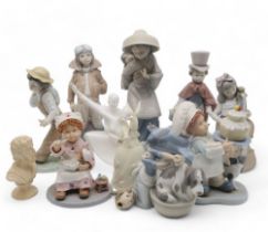 A collection of Lladro figures including Over the Clouds, 5697, Little Pilot 6451, Out for a