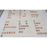 The Century Stamp Album containing worldwide stamps together with hinged on sheets  good early